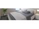 Modern bedroom with neutral grey and white decor, including carpet and bedside lamps at 315 Lakeside Ln, Woodstock, GA 30188