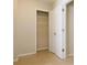 Tile floor outside of a closet with multiple shelves at 315 Lakeside Ln, Woodstock, GA 30188