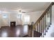 Spacious living room with fireplace, hardwood floors and large windows at 315 Lakeside Ln, Woodstock, GA 30188