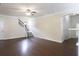 Bright living room with hardwood floors and staircase, perfect for entertaining at 315 Lakeside Ln, Woodstock, GA 30188