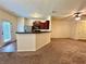 Spacious living room, stainless steel fridge, kitchen, and adjacent dining area at 664 Oakside Pl, Acworth, GA 30102