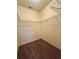 Walk-in closet with carpet flooring and built-in metal storage shelving at 664 Oakside Pl, Acworth, GA 30102