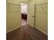 Walk-in closet with carpet flooring, metal shelving and access to ensuite bathroom at 664 Oakside Pl, Acworth, GA 30102