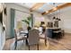 An open-concept kitchen and dining area with modern appliances, granite countertops and access to the backyard at 81 Heritage Pointe Dr, Villa Rica, GA 30180