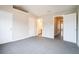 Spacious bedroom featuring neutral paint, two closets, and ensuite bathroom at 2709 Heathrow Dr, Lawrenceville, GA 30043