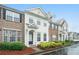 Well-maintained townhouse featuring a landscaped front yard and welcoming entrance at 2709 Heathrow Dr, Lawrenceville, GA 30043