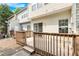 Spacious deck for outdoor enjoyment with stairs that descend to a patio and tree-lined backyard at 2754 Terrell Trace Dr, Marietta, GA 30067