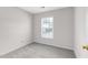Bedroom with a carpeted floor and large window at 2754 Terrell Trace Dr, Marietta, GA 30067