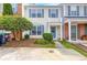 Inviting two-story home showcasing a charming front exterior with a balcony, neat landscaping, and a paved walkway at 2754 Terrell Trace Dr, Marietta, GA 30067