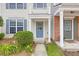Charming two-story home with inviting blue front door and well-maintained landscaping at 2754 Terrell Trace Dr, Marietta, GA 30067