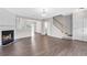 Inviting living room with a cozy fireplace and a staircase leading to the upper level at 2754 Terrell Trace Dr, Marietta, GA 30067