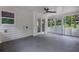 This screened-in porch has lots of space and views of the yard at 5666 Fawn Dr, Powder Springs, GA 30127