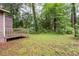 Exterior view of wooden deck overlooking the backyard at 9383 Woodknoll Way, Jonesboro, GA 30238