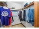 Walk in closet with clothes, shelving, and storage at 9383 Woodknoll Way, Jonesboro, GA 30238