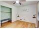 Cozy bedroom with hardwood floors and an open closet at 122 Vickery Dr, Fairburn, GA 30213