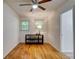 Bedroom featuring neutral colors, hardwood floors and lots of natural lighting at 122 Vickery Dr, Fairburn, GA 30213