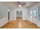 Versatile bonus room with hardwood floors and natural light, offering flexible living space at 122 Vickery Dr, Fairburn, GA 30213
