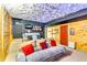Finished basement with a projector, movie screen, couch, and custom lighting creating a cozy entertainment space at 2200 E Lake E Rd, Mcdonough, GA 30252