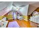 Bright bedroom with vaulted ceiling and colorful decor at 2200 E Lake E Rd, Mcdonough, GA 30252
