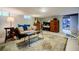 Open basement living space features an area rug, comfortable seating, and an accent table at 4611 Dogwood Rd, Pine Lake, GA 30072