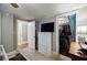Bedroom featuring closet space and a TV, creating a cozy and functional retreat at 4611 Dogwood Rd, Pine Lake, GA 30072