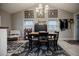 Charming dining room with a table set for four, and decorative wall art at 4611 Dogwood Rd, Pine Lake, GA 30072