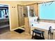 Bright bathroom featuring a glass shower, soaking tub, and a neutral color scheme at 558 Hideaway Dr, Jonesboro, GA 30238