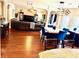 Open-concept living and dining area with modern decor and plenty of natural light at 558 Hideaway Dr, Jonesboro, GA 30238