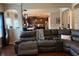 Spacious living room with neutral paint, archways, and entry into the kitchen at 558 Hideaway Dr, Jonesboro, GA 30238