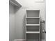 Organized walk-in closet with built-in shelving and ample storage space at 603 Summit North Ne Dr # 603, Atlanta, GA 30324