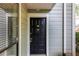 Black front door with gold hardware and unit number 603 at 603 Summit North Ne Dr # 603, Atlanta, GA 30324