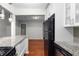Bright kitchen features granite countertops, stainless steel appliances, and hardwood floors at 603 Summit North Ne Dr # 603, Atlanta, GA 30324