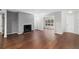 Open living space with hardwood floors, fireplace, and natural light at 603 Summit North Ne Dr # 603, Atlanta, GA 30324