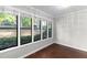Bright living room with hardwood floors and large windows providing natural outdoor views at 603 Summit North Ne Dr # 603, Atlanta, GA 30324
