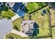 Aerial view of a well maintained backyard with a playset and trampoline at 6168 Sweet Birch Ct, Acworth, GA 30101