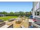 Cozy deck area perfect for relaxing with comfortable seating and a view of the lush green lawn at 6168 Sweet Birch Ct, Acworth, GA 30101