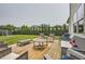 Spacious backyard deck with cozy seating and lush green lawn, perfect for outdoor entertaining at 6168 Sweet Birch Ct, Acworth, GA 30101