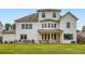 Expansive backyard featuring a large deck, outdoor seating, and a well-maintained lawn, great for entertaining at 6168 Sweet Birch Ct, Acworth, GA 30101