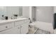 Clean bathroom featuring a white vanity, subway tile shower, and modern fixtures at 6168 Sweet Birch Ct, Acworth, GA 30101