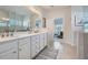 Bathroom featuring double sink vanity, and a separate glass shower enclosure at 6168 Sweet Birch Ct, Acworth, GA 30101