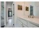 Bright bathroom with double sinks, and framed alphabet artwork at 6168 Sweet Birch Ct, Acworth, GA 30101