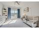 Cozy bedroom with natural light, large window, and neutral carpet at 6168 Sweet Birch Ct, Acworth, GA 30101