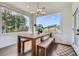 Cozy breakfast nook with large windows, a charming table setting, and views of the outdoors at 6168 Sweet Birch Ct, Acworth, GA 30101