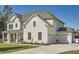 Charming home showcasing its side and back, complemented by a well-manicured lawn and a convenient attached garage at 6168 Sweet Birch Ct, Acworth, GA 30101