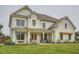 Charming two-story home with a beautifully landscaped yard and inviting front porch at 6168 Sweet Birch Ct, Acworth, GA 30101
