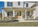 Inviting front porch with comfortable seating, decorative plants, and an attractive entrance at 6168 Sweet Birch Ct, Acworth, GA 30101