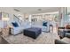 Bright and spacious living room featuring a plush sectional sofa, stylish decor, and an inviting atmosphere at 6168 Sweet Birch Ct, Acworth, GA 30101