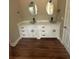 Bathroom featuring a double sink vanity with modern fixtures at 1119 Plantation Se Dr, Conyers, GA 30094