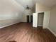 Large bedroom with open closet, ceiling fan, and ample natural light at 1119 Plantation Se Dr, Conyers, GA 30094