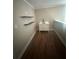 Hallway nook includes modern shelves and a sleek vanity sink at 1119 Plantation Se Dr, Conyers, GA 30094